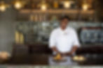 Chef with gourmet dishes during food photography cape town
