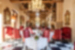 la residence Cape Town restaurant dining room with red chairs
