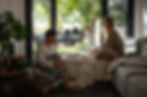 Couple playing a board game in a cozy living room
