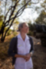 Professional portrait photography of woman laughing outdoors