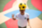 Boy balancing soccer ball on head, commercial photographer Cape Town
