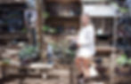 Woman at ROF-STYLE booth for commercial photography services.
