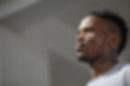 Professional portrait photography of a man looking away.