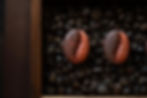 Coffee bean chocolates on roasted beans, food photography cape town