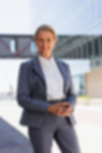 Professional portrait photography of a business woman in a suit
