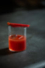 Red cocktail with garnish, food photography Cape Town.