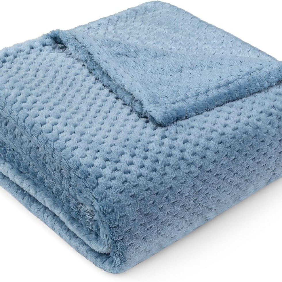 Folded soft blue waffle fleece throw blanket
