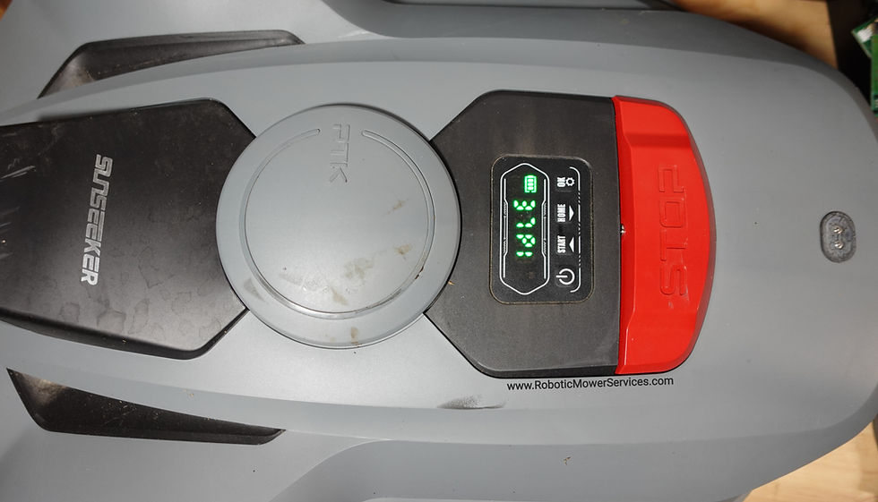 Close-up view of the Sunseeker Orion X7 robotic mower's cutting disk