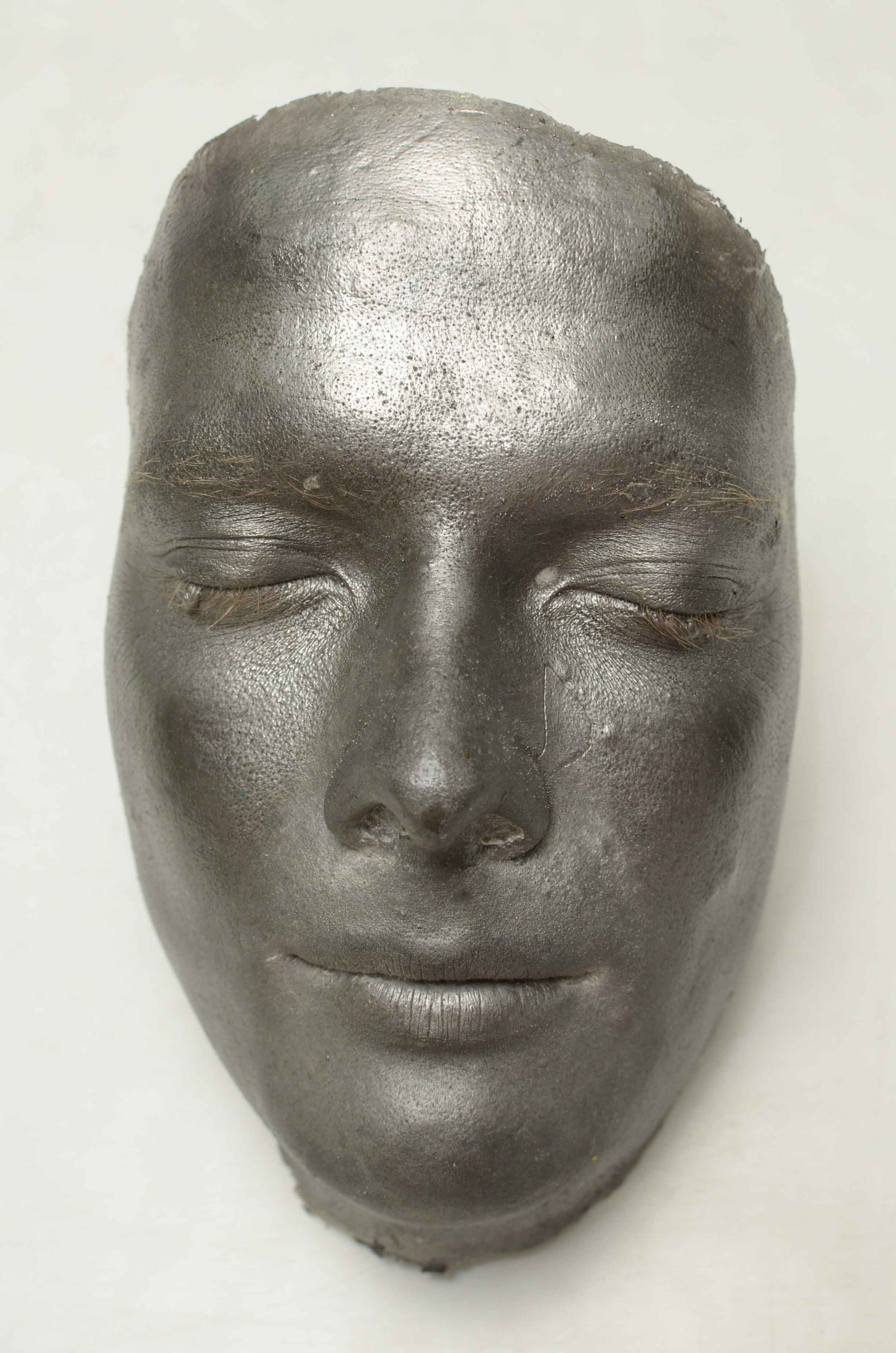 Frontal view of face cast.