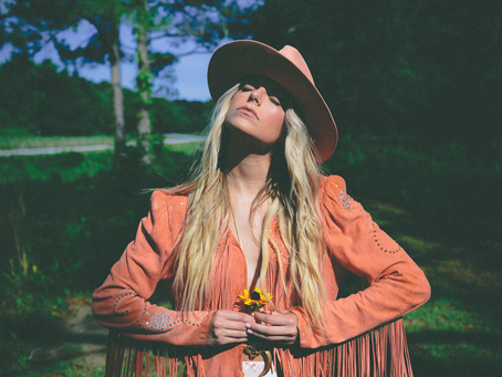 Carter Faith Leans Into Some 70s Flair With Catchy New Track "Cowboy Forever"