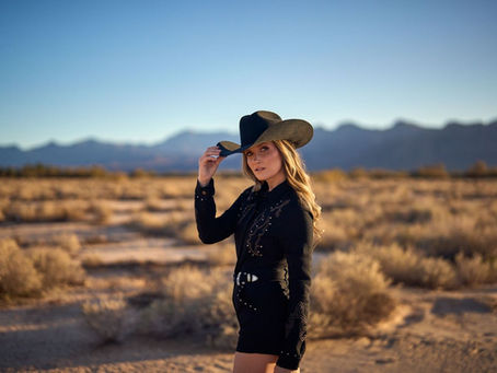 Kalsey Kulyk Draws a Line in the Neon With “Your Side of the Bar”