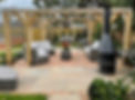 Sandstone and brick detail with pergola