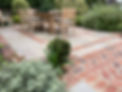 Natural stone and brick patio design