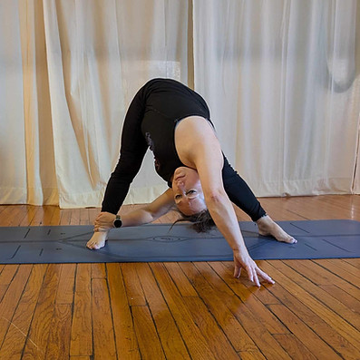 wide leg forward fold with twist.jpg