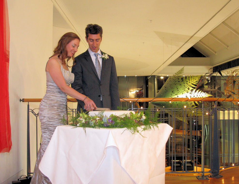The Happy Couple cuts the cake