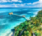 aerial-view-of-bungalow-white-sandy-beach-sea-an-2026-03-25-05-08-24-utc.jpg