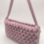 Thumbnail: dusky pink small shoulder bag with short handle with knotted pattern