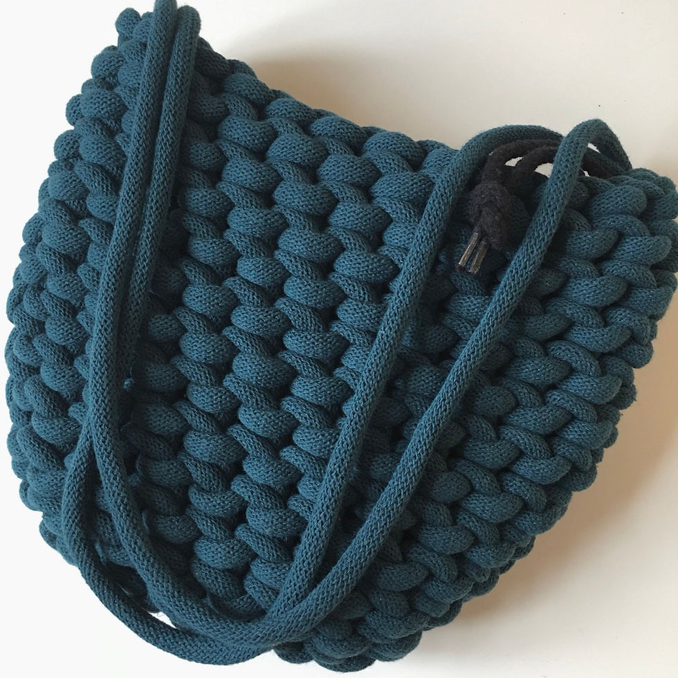 Thumbnail: close up of chunky knotted cotton cord shoulder bag with rounded bottom