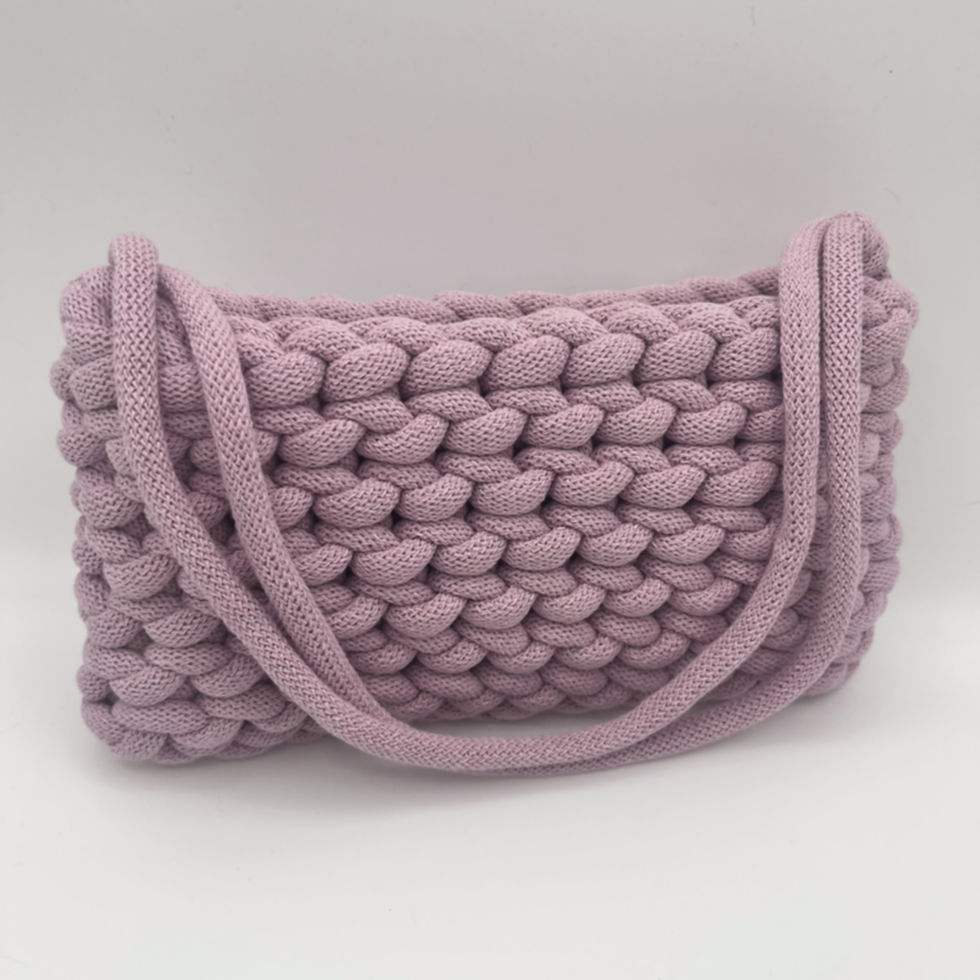 Thumbnail: front view of woven patterned dusky pink small bag woth short handle