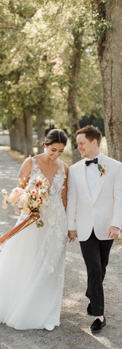 Bride and groom walking hand-in-hand for their swedish wedding