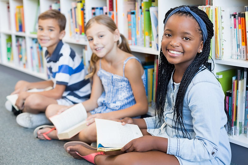 3 children with books