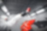 Auto body repairer spraying quarter panel red_edited.jpg