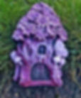 Purple magical fairy door garden ornament. Made of Cast Stone. A lovely gift for family friends or loved one.