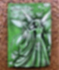 Green Fairy garden ornament which says magic happens on the plaque. This garden fairy plaque is made of stone in the UK.