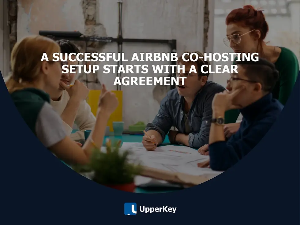 Group of people in discussion around a table, representing Airbnb co-host agreement planning