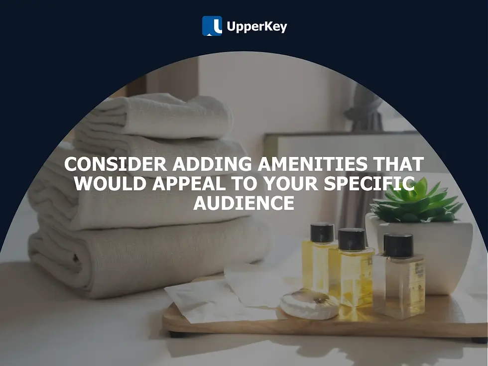 Rolled towels, toiletries, and a potted plant in sunlight