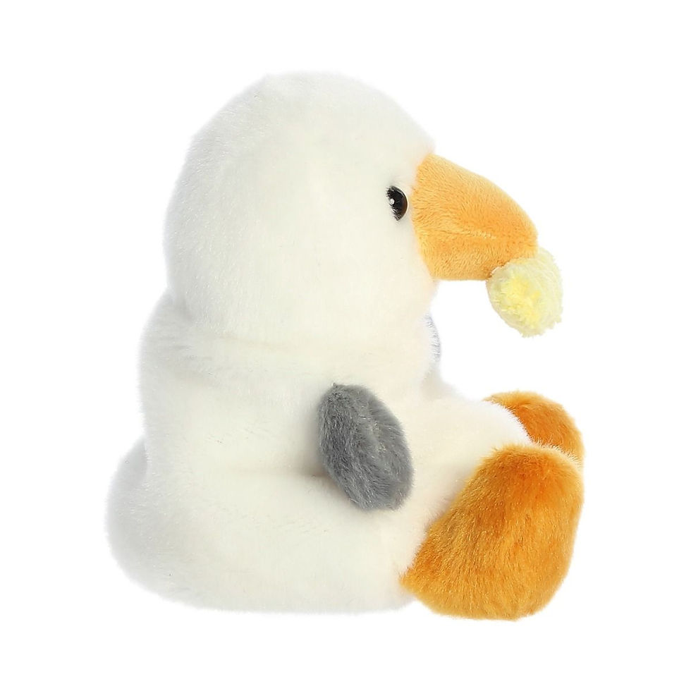 Side view Palm Pals 13cm Buoy the Seagull plush toy with soft white fur, orange feet, yellow beak with chips, gray hands
