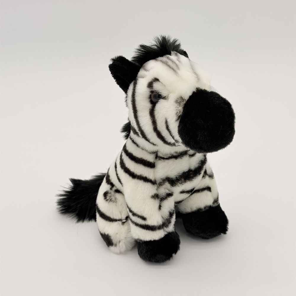Front view Lil Friends 18cm Zebra plush toy with soft black and white striped fur, black mane, tail, nose and ears