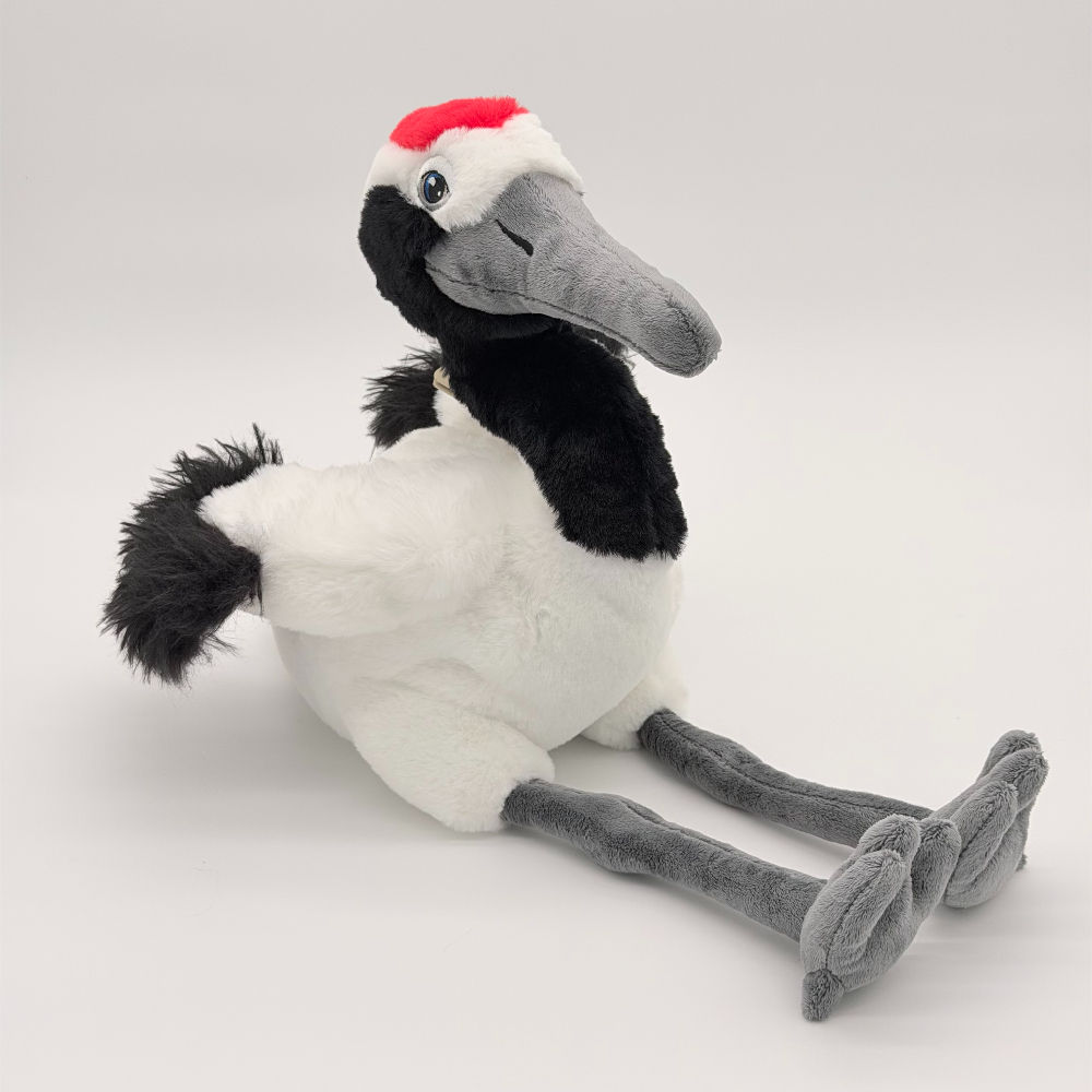 Front view Wild Republic 30cm Red Crowned Crane plush toy features black and white body, red crest and gray beak and legs