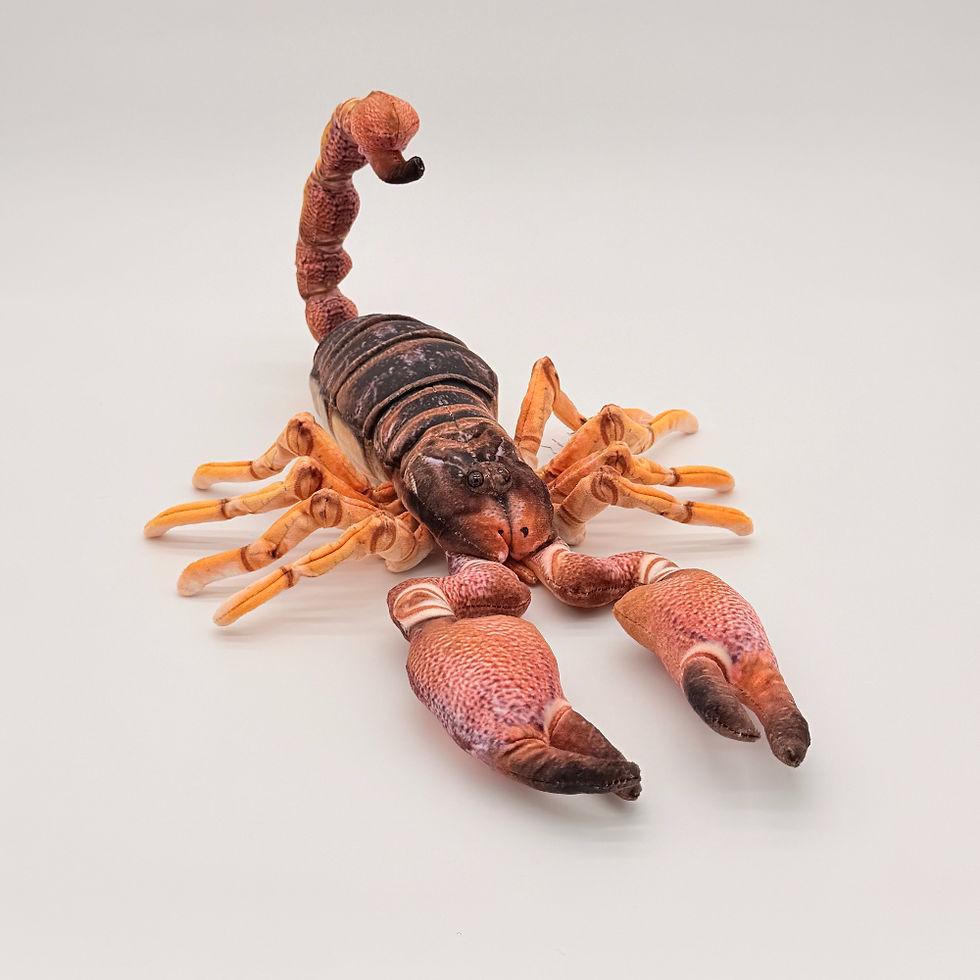 Front view Huggable Toys 38cm Scorpion plush toy with soft orange brown fabric, stinger tipped tail and large front pincers.