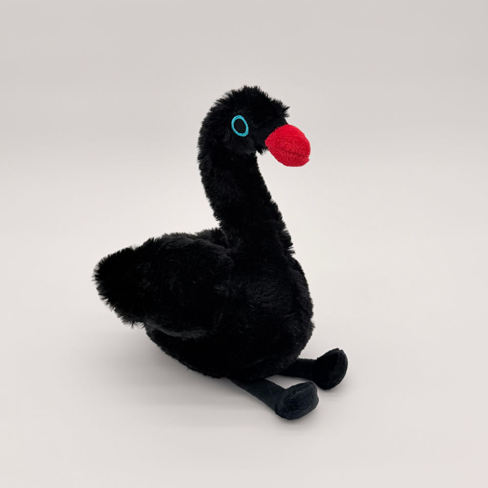 Front view Huggable Toys 24cm Black Swan plush toy with soft black fur, blue eyes and red beak