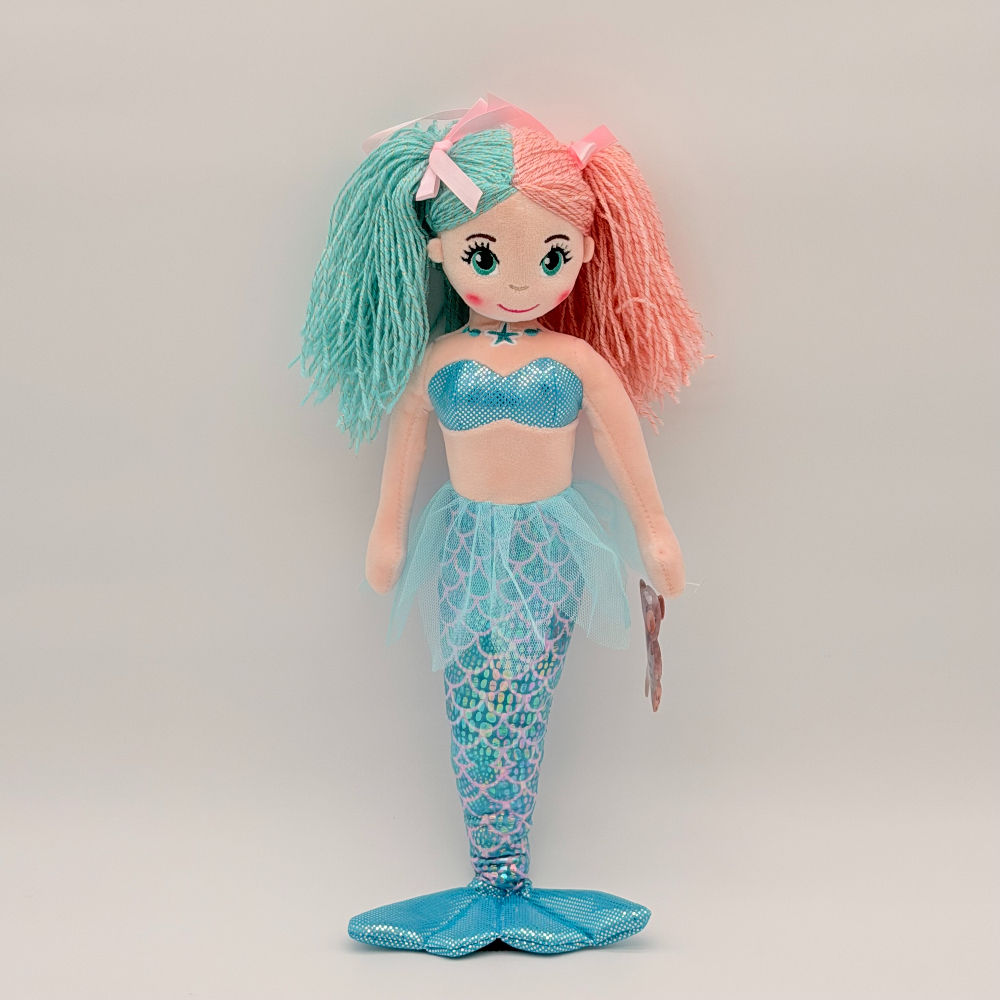 Front view Huggable Toys Sandy Mermaid plush doll with soft velvety face, aqua & pink pigtails, aqua shimmering tail and fin