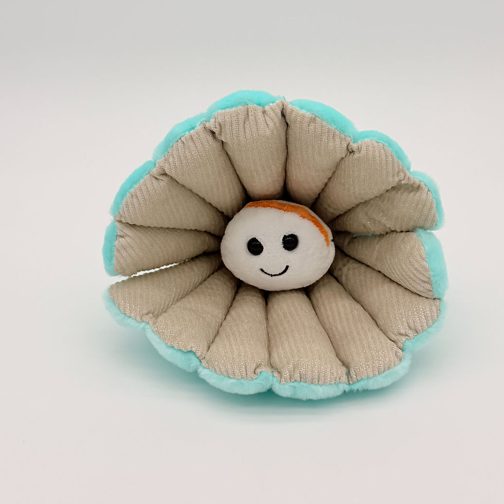 Front view Huggable Toys 24cm Pearl plush toy with soft turquoise fur clam shell with gray inner and smiley face white pearl