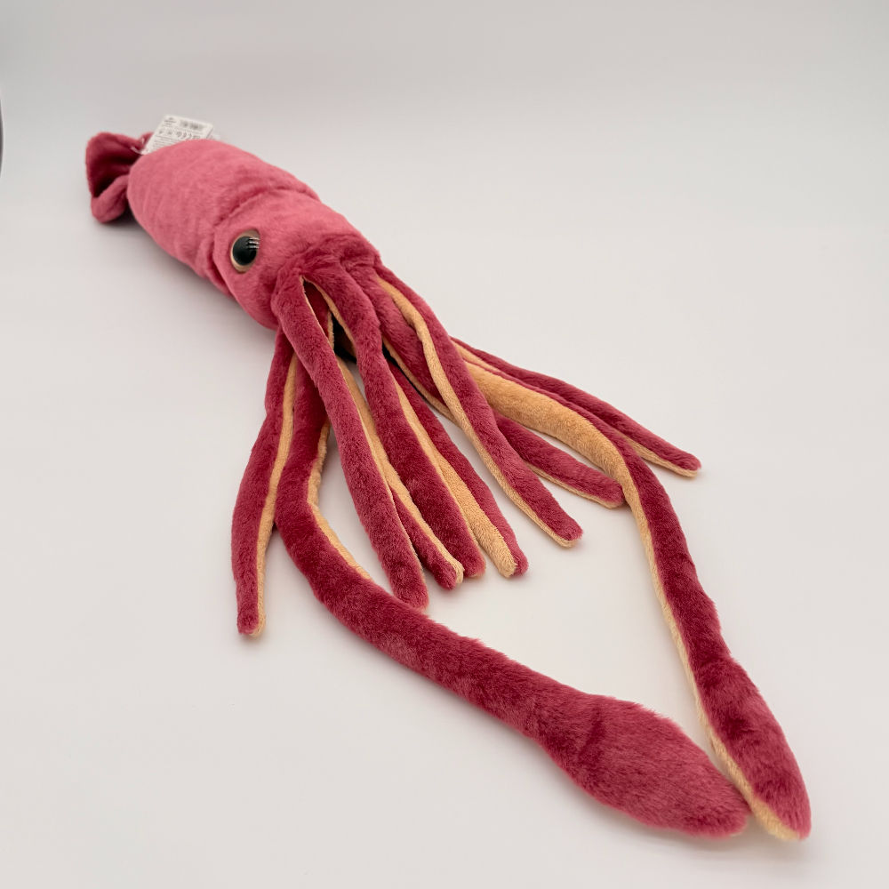Front view Wild Republic 35cm giant squid plush toy with a long, textured dark red body, eight short arms, two long tentacles