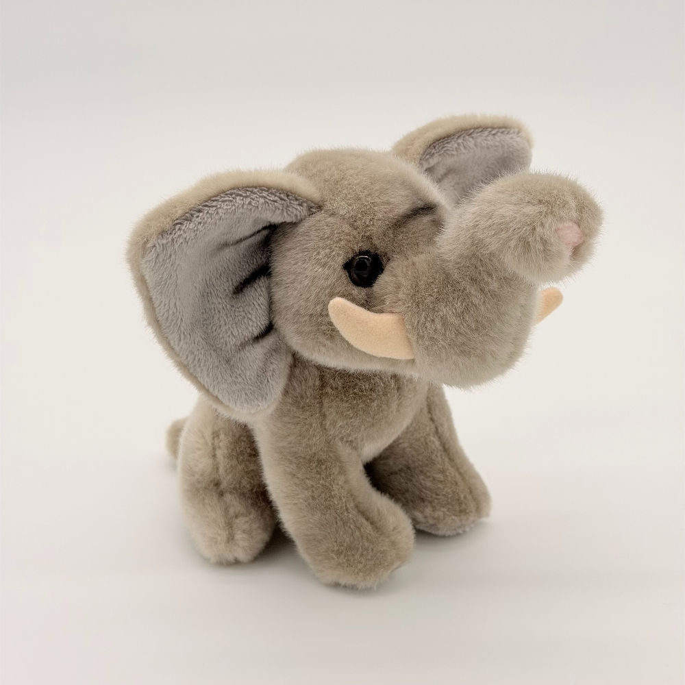 Front view Lil Friends 18cm Elephant plush toy with soft gray fur, large ears, raised trunk and pink tusks
