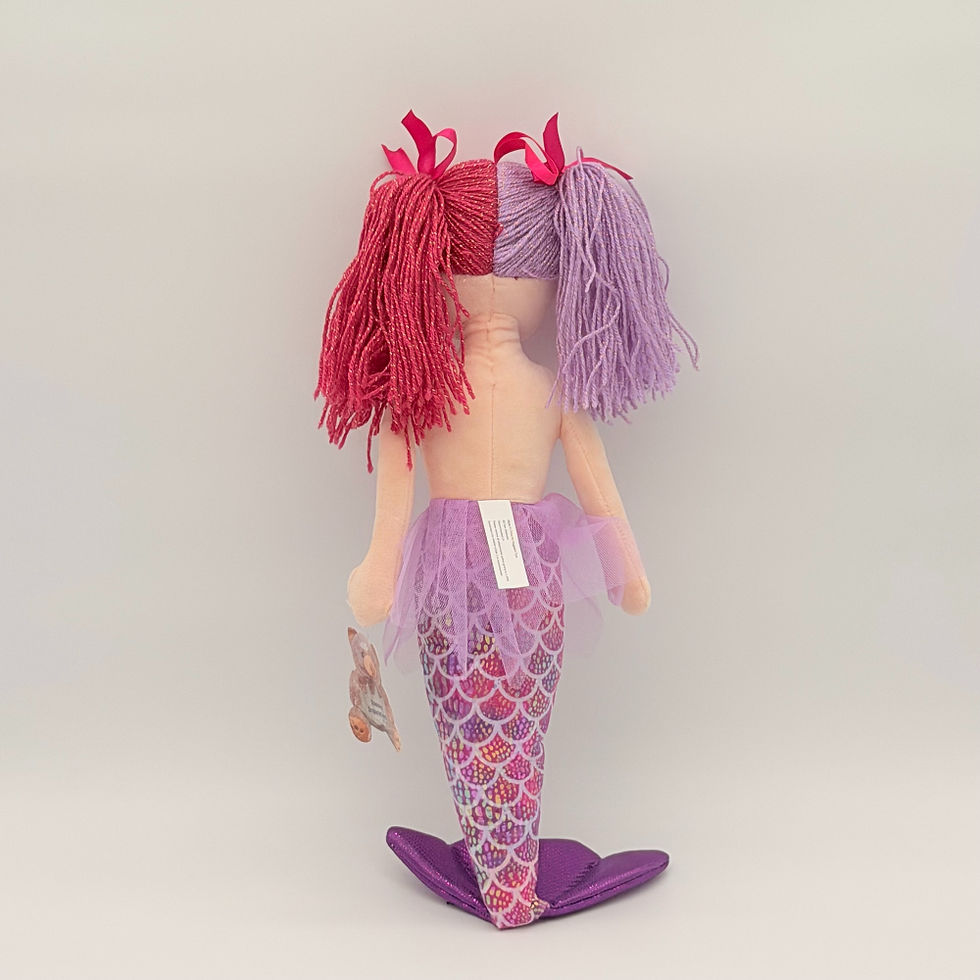 Back view Huggable Toys Calypso Mermaid plush doll with red & purple pigtails, purple tuille skirt and purple shimmery tail