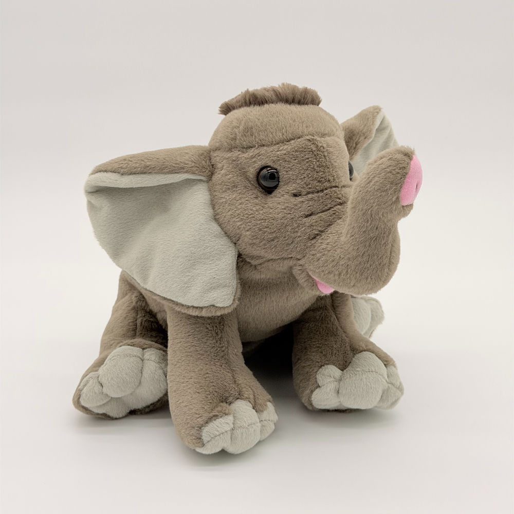 Front view Wild Republic 30cm Baby Elephant with soft gray fur, large floppy ears, tuft of hair on head and raised trunk