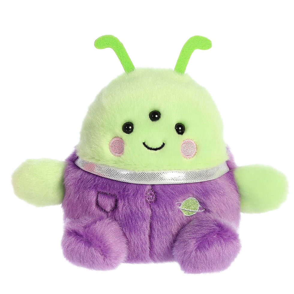 Front view Zorg the Alien plush toy by Palm Pals. A smiling green toy with three eyes, wearing a purple spacesuit