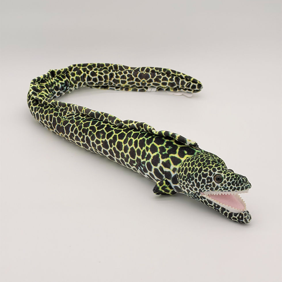 Back view Huggable Toys 76cm Eel plush toy with soft yellow black, white mottled fabric, white teeth, pink inside mouth
