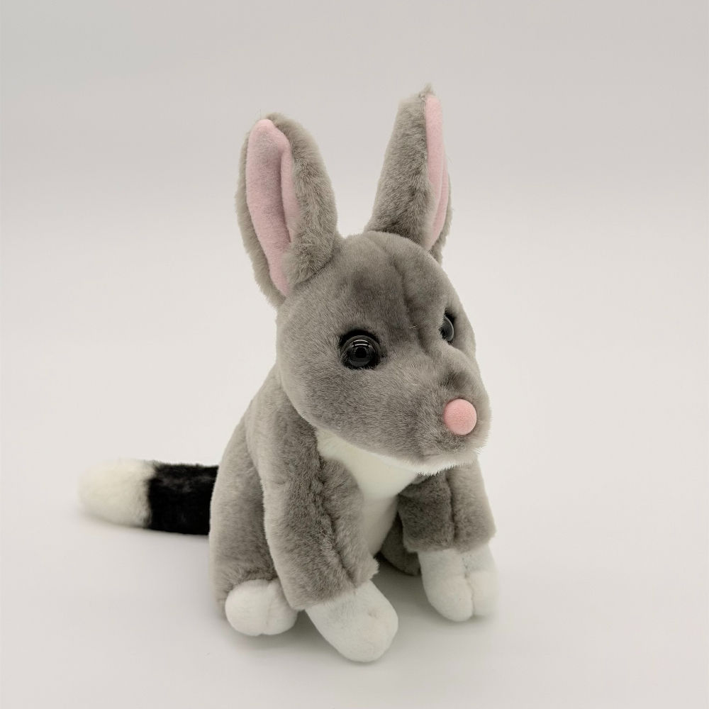Front view Dinki Di 15cm Bilby plush toy with soft gray fur, pink inner ears and nose, white feet and chest, large eyes