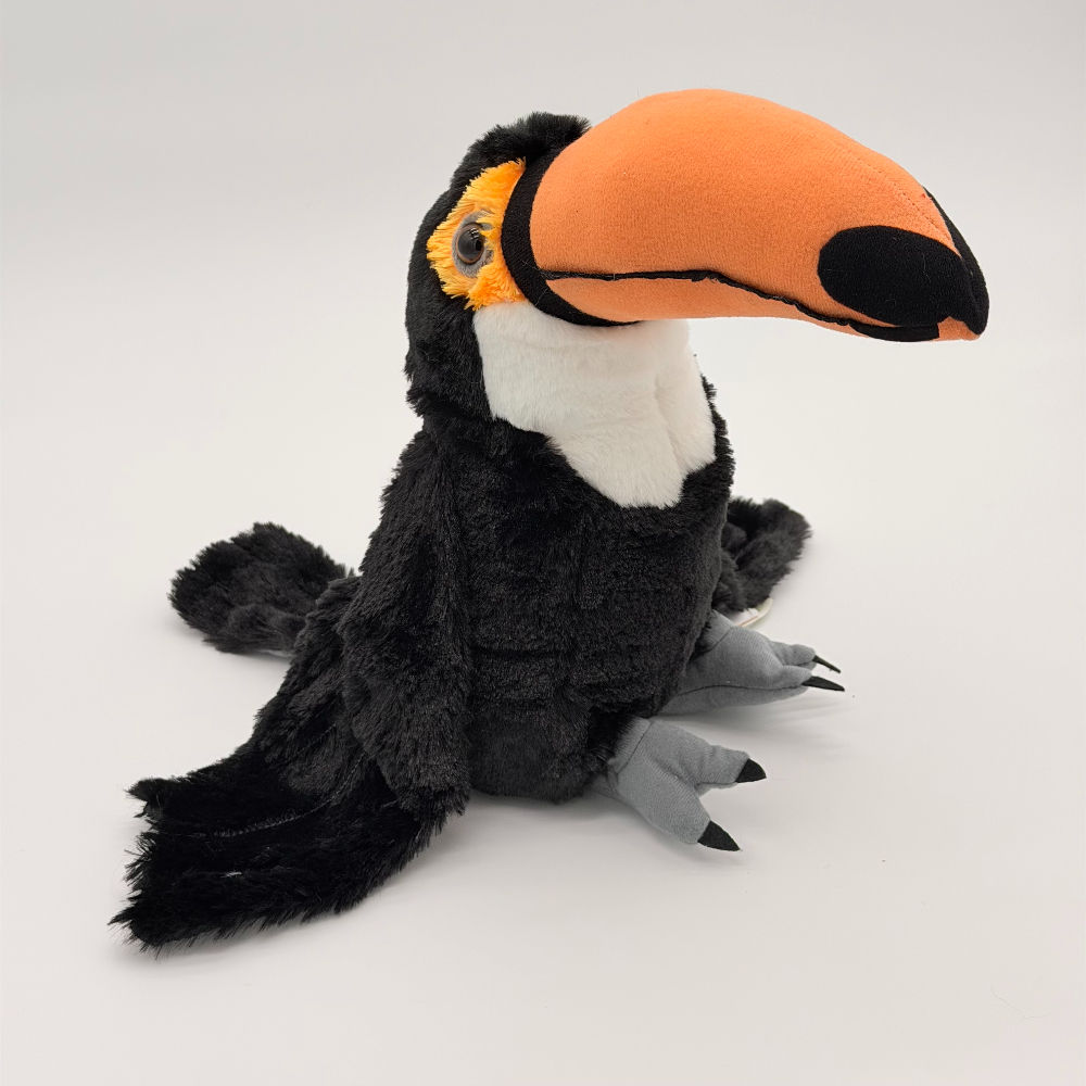 Front view wild Republic 30cm Toucan plush toy features soft black body, white neck, gray feet, large orange beak