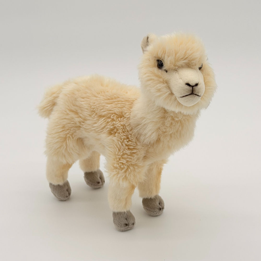 Front view Living Nature 24cm Alpaca plush toy featuring soft white fur, gray feet and ears, black eyes