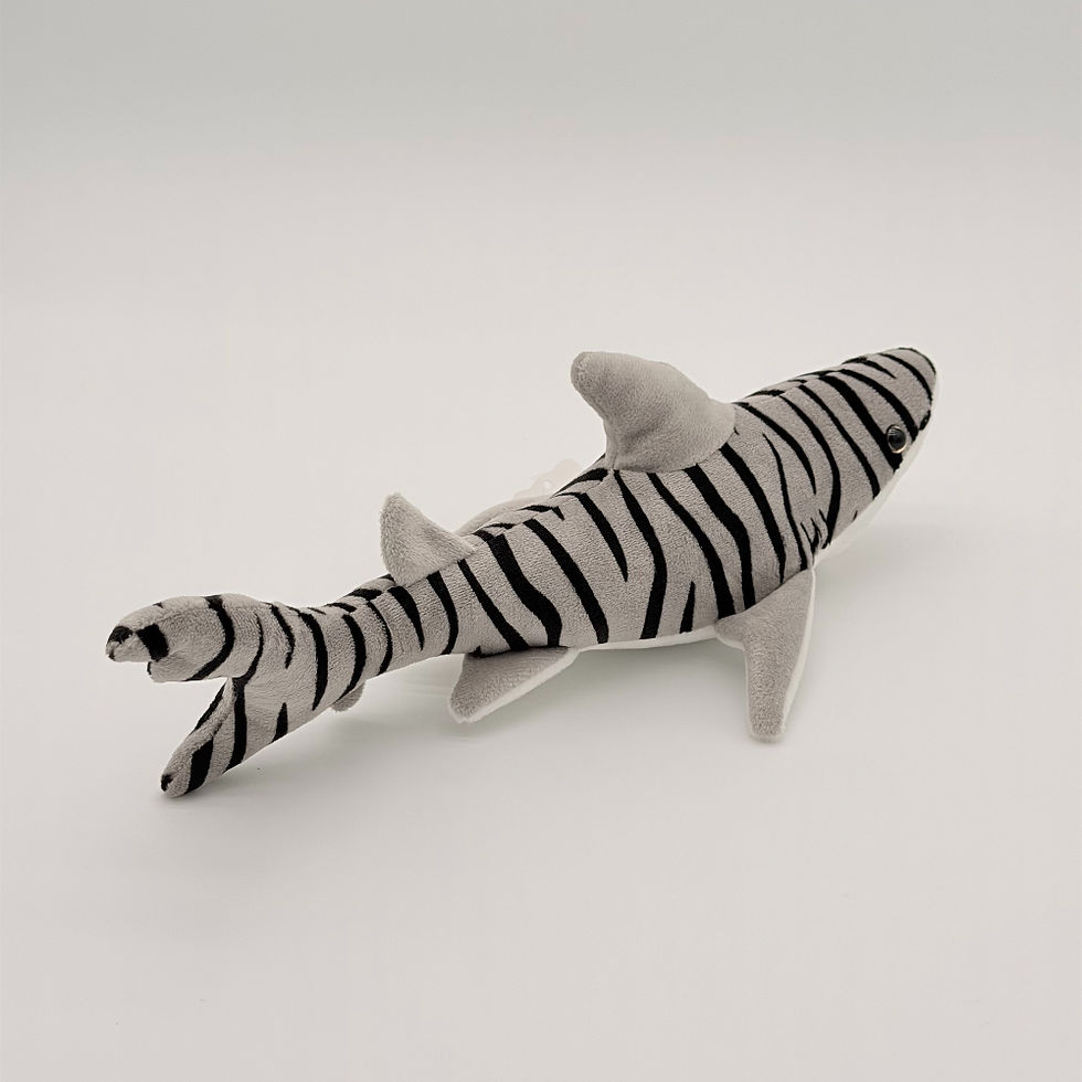 Back view Huggable Toys 32cm Tiger shark plush toy with soft velour gray and black striped body, gray fins, white belly