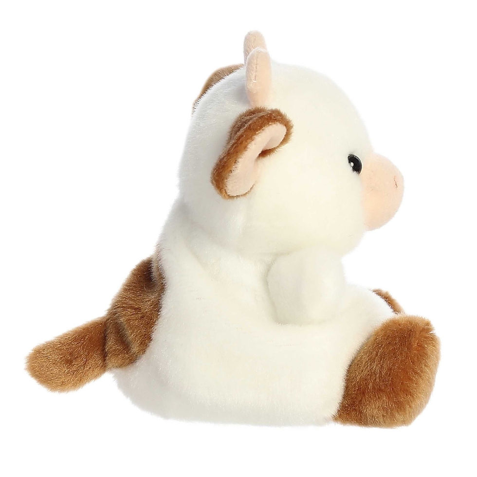 Side view Palm Pals 13cm Caroline the Brown Cow plush toy. Features soft white fur with brown patches and ears, pink nose