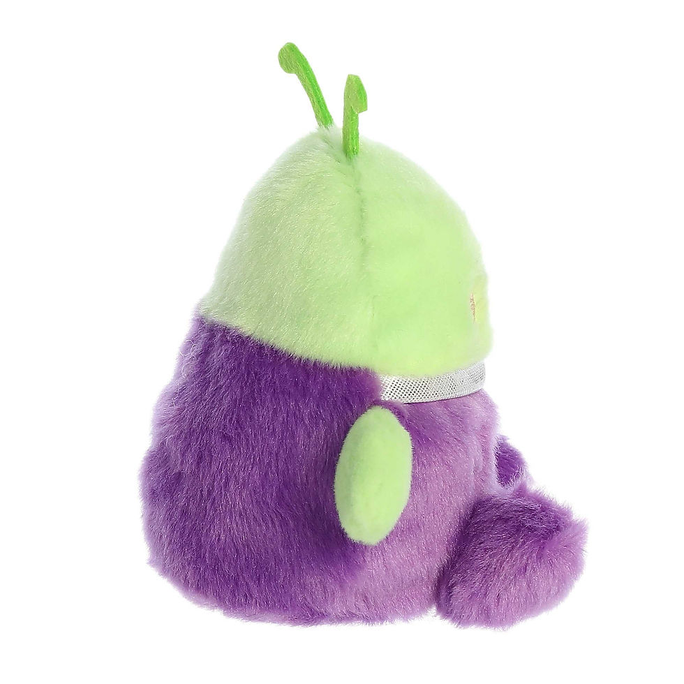 Side view Zorg the Alien plush toy by Palm Pals. A smiling green toy with three eyes, wearing a purple spacesuit