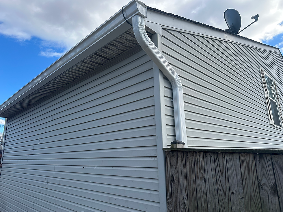 Newly installed gutter and downspout on Lansdowne, MD home by Shepherd & Sons Inc.
